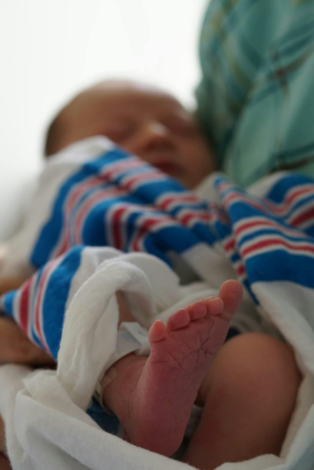 A photo of a newborn's foot