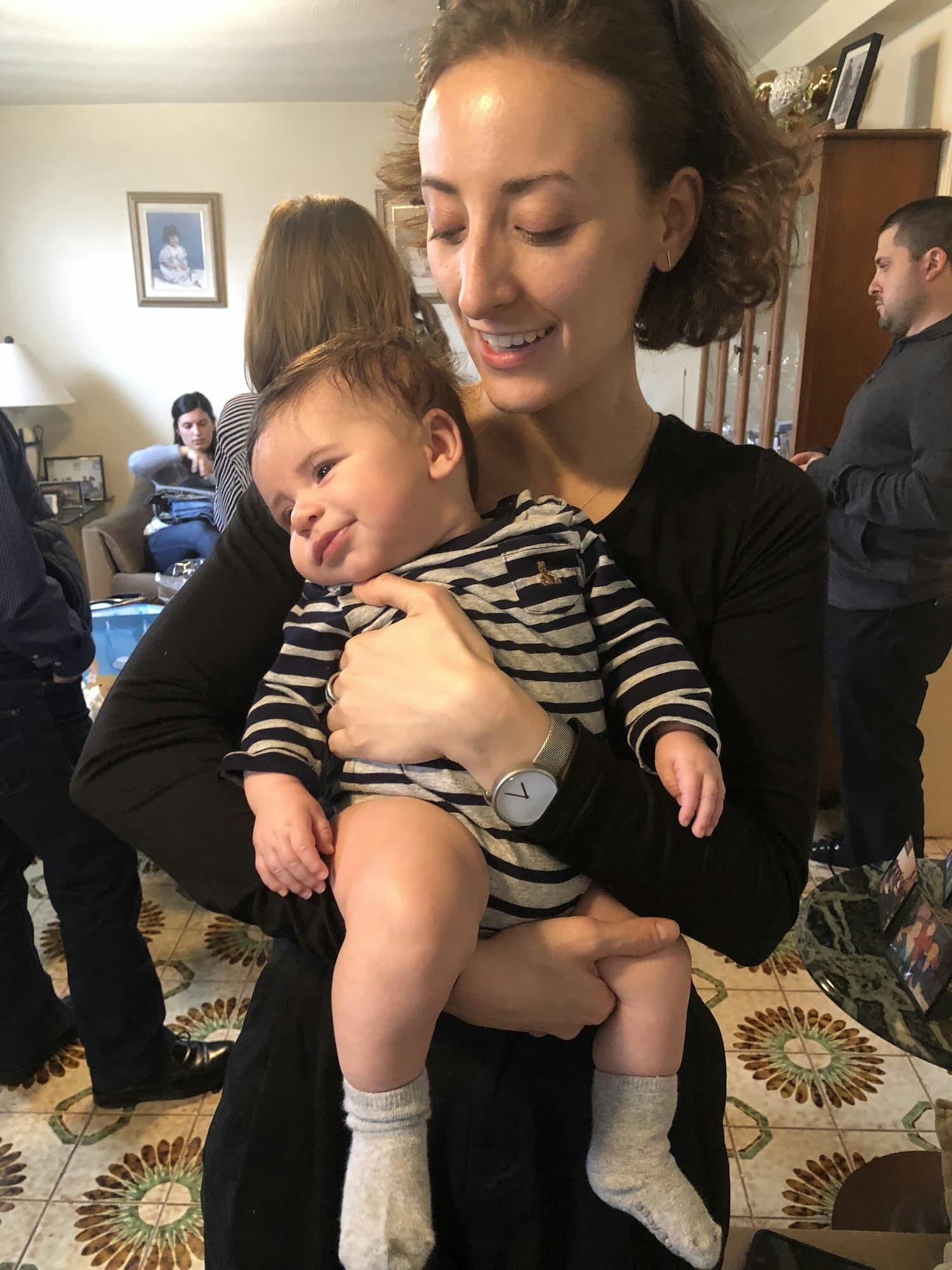 Alessia holding her cousin's son, Giacomo