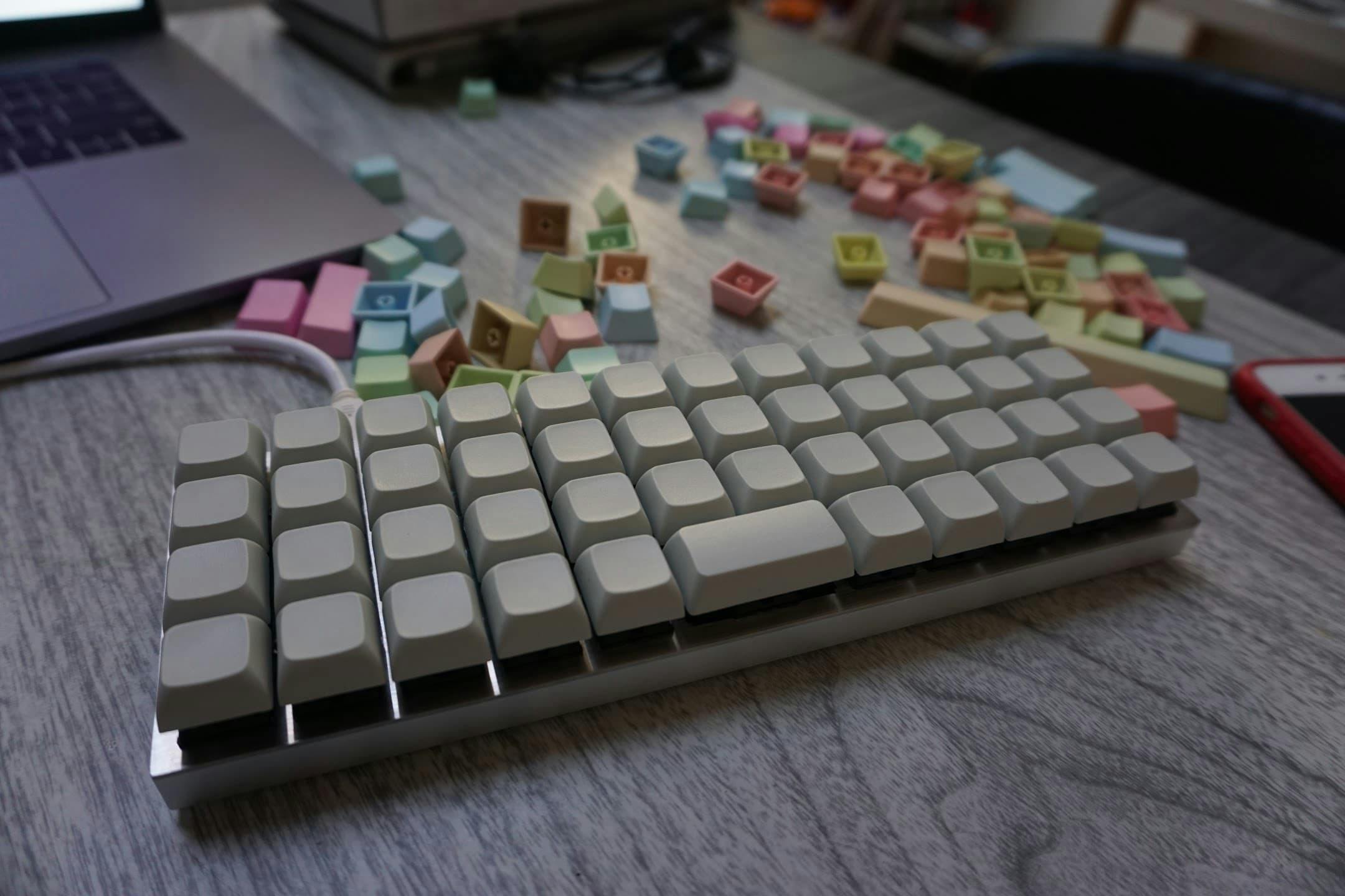 My second keyboard, a Planck OLKB, with beige XDA PBT blank keycaps which have a uniform profile