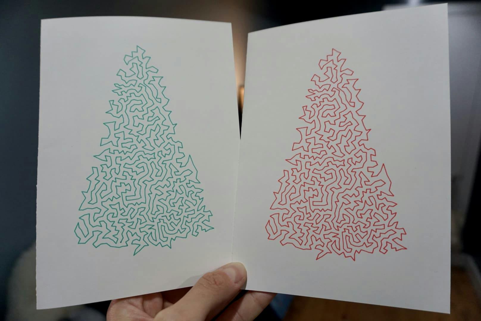 A pen plotter holiday greeting card that is using a traveling salesman algorithm to create a Christmass tree out of a single line traversing many points