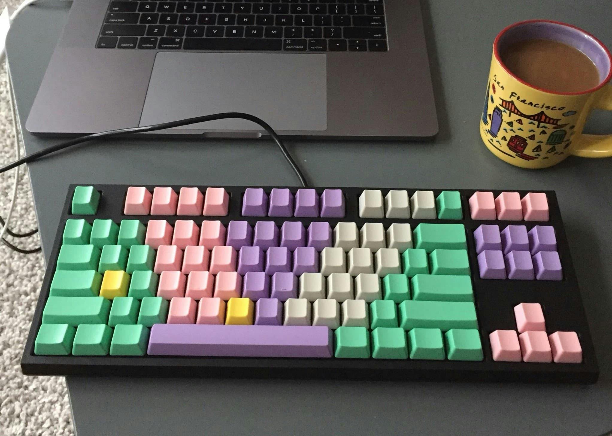 My first mechanical keyboard: WASD 87-key with Cherry MX Brown switches and seafoam green, pink, purple, grey and yellow keycaps